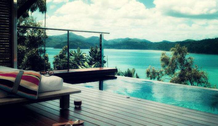 How does the economy influence the luxury property market?